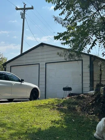 a backyard of a house with lots of green space