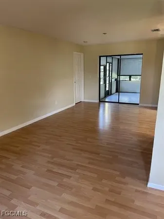 a view of livingroom with hardwood floor and window