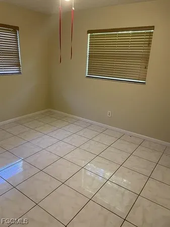 a view of a room & utility room and window