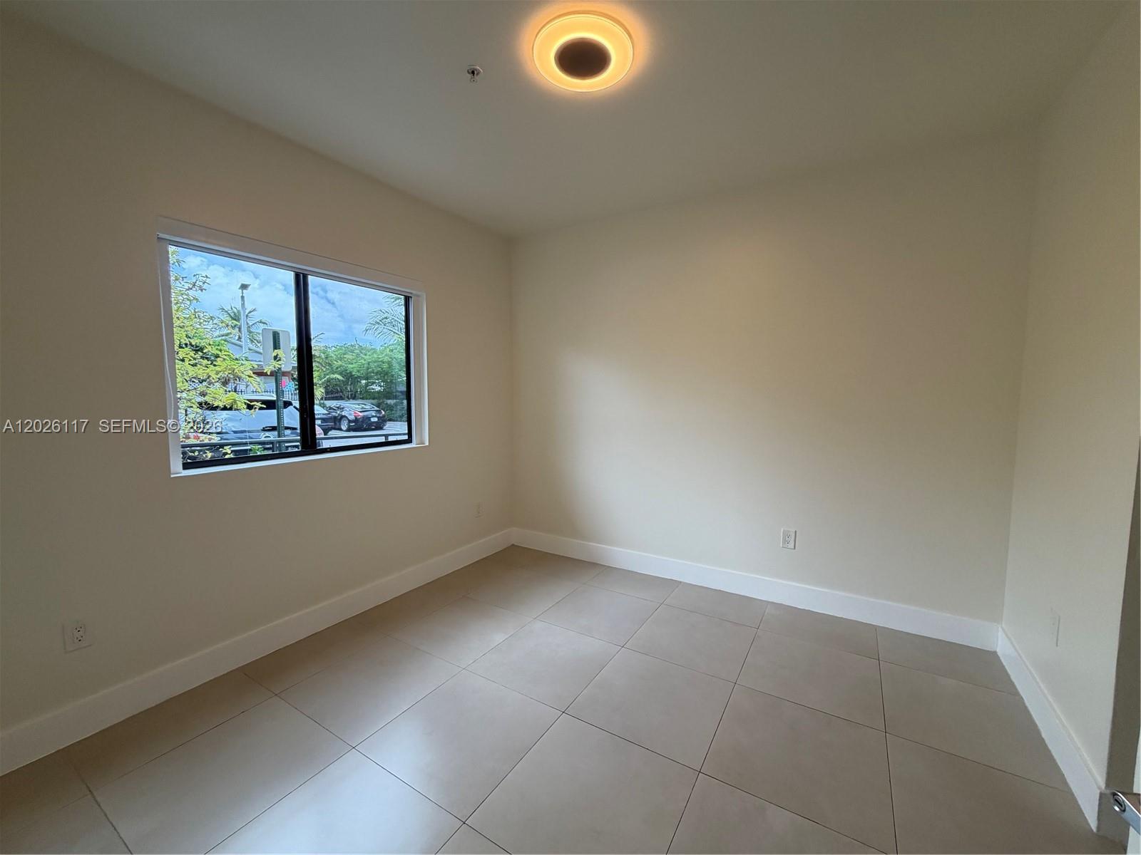 2425 Northwest 24th Avenue, Unit 103 Miami, FL 33142 - Photo 9 of 12