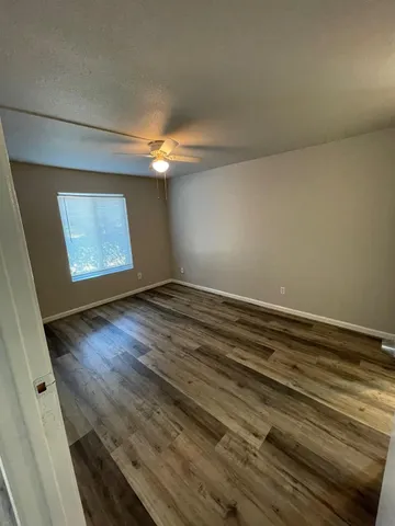 a view of an empty room and window