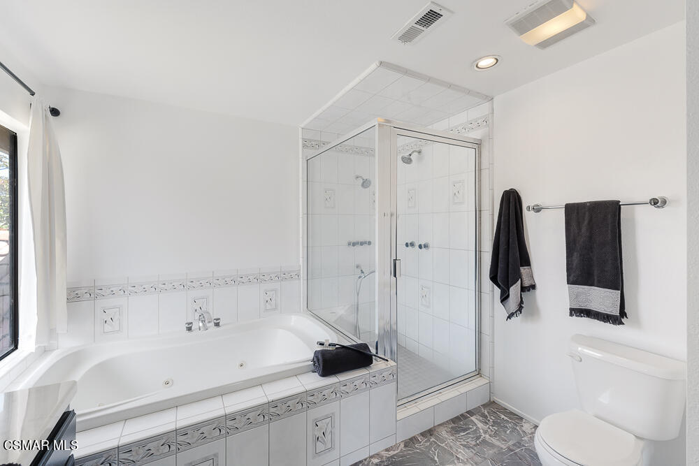 4035 Cliffrose Avenue Moorpark, CA 93021 - Photo 25 of 43 a bathroom with a sink a toilet and shower