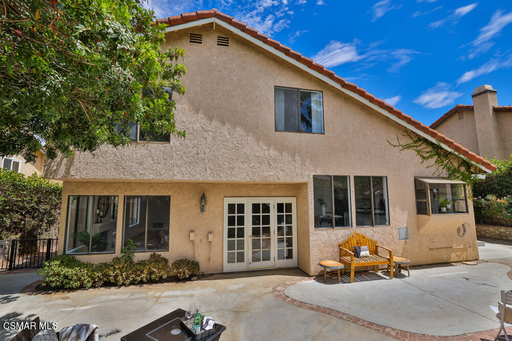 4035 Cliffrose Avenue Moorpark, CA 93021 - Photo 34 of 43 a front view of a house with a yard