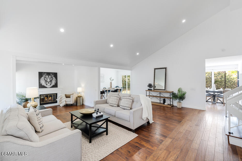4035 Cliffrose Avenue Moorpark, CA 93021 - Photo 5 of 43 a living room with furniture or couch and a wooden floor