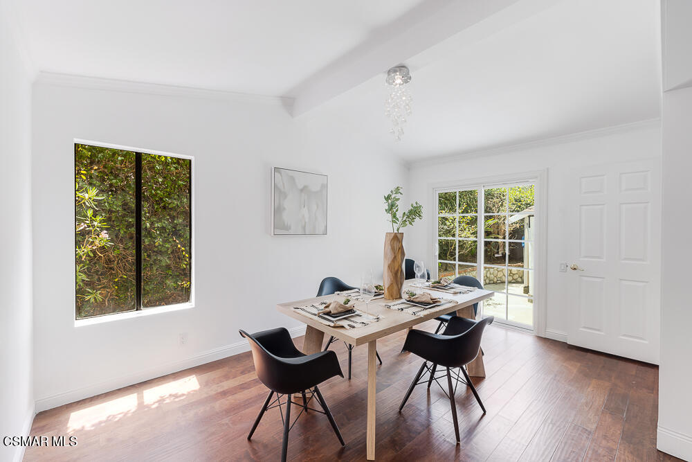 4035 Cliffrose Avenue Moorpark, CA 93021 - Photo 9 of 43 a view of a dining room with a table and chairs