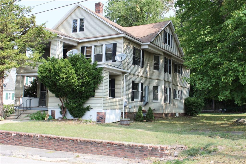 44 Bird Street Torrington, CT 06790 - Photo 1 of 1 a front view of a house with a yard