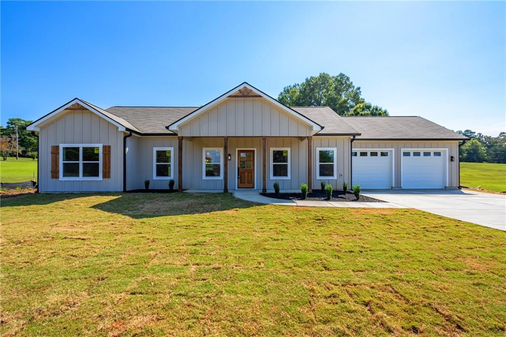 68 Cherokee Terrace Cedartown, GA 30125 - Photo 1 of 1 a view of a house with swimming pool and a yard