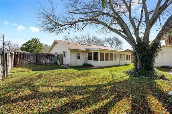 a front view of a house with yard