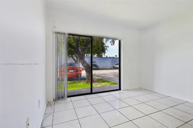 a view of an entryway with a garden