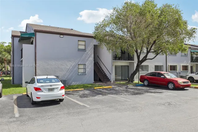 a car parked in front of a house