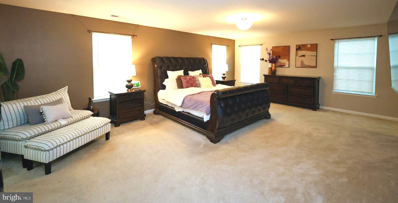 152 Tywyn Drive Middletown, DE 19709 - Photo 11 of 25 a bedroom with a bed couch and window