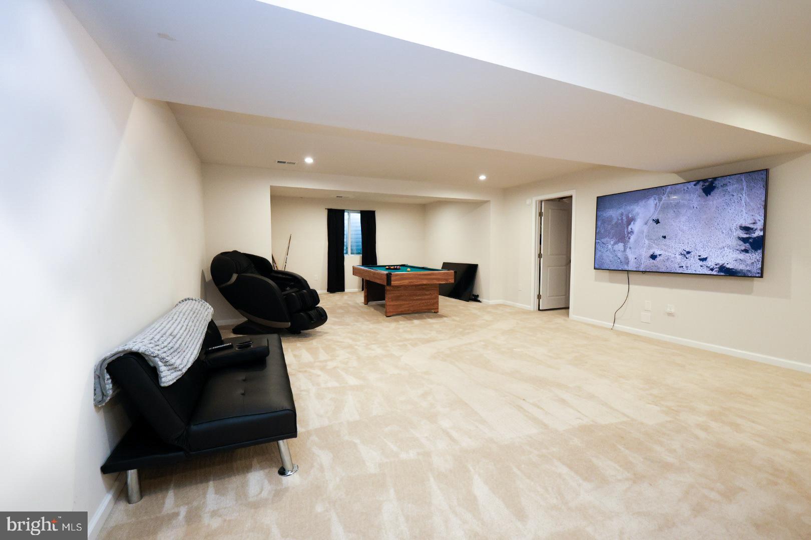 152 Tywyn Drive Middletown, DE 19709 - Photo 20 of 25 a living room with furniture and a painting on the wall