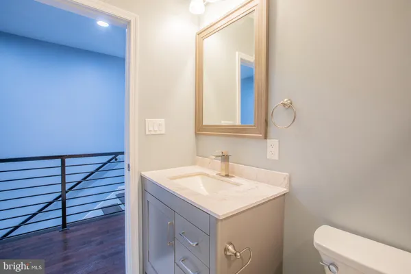 a view of a hallway with washer and dryer