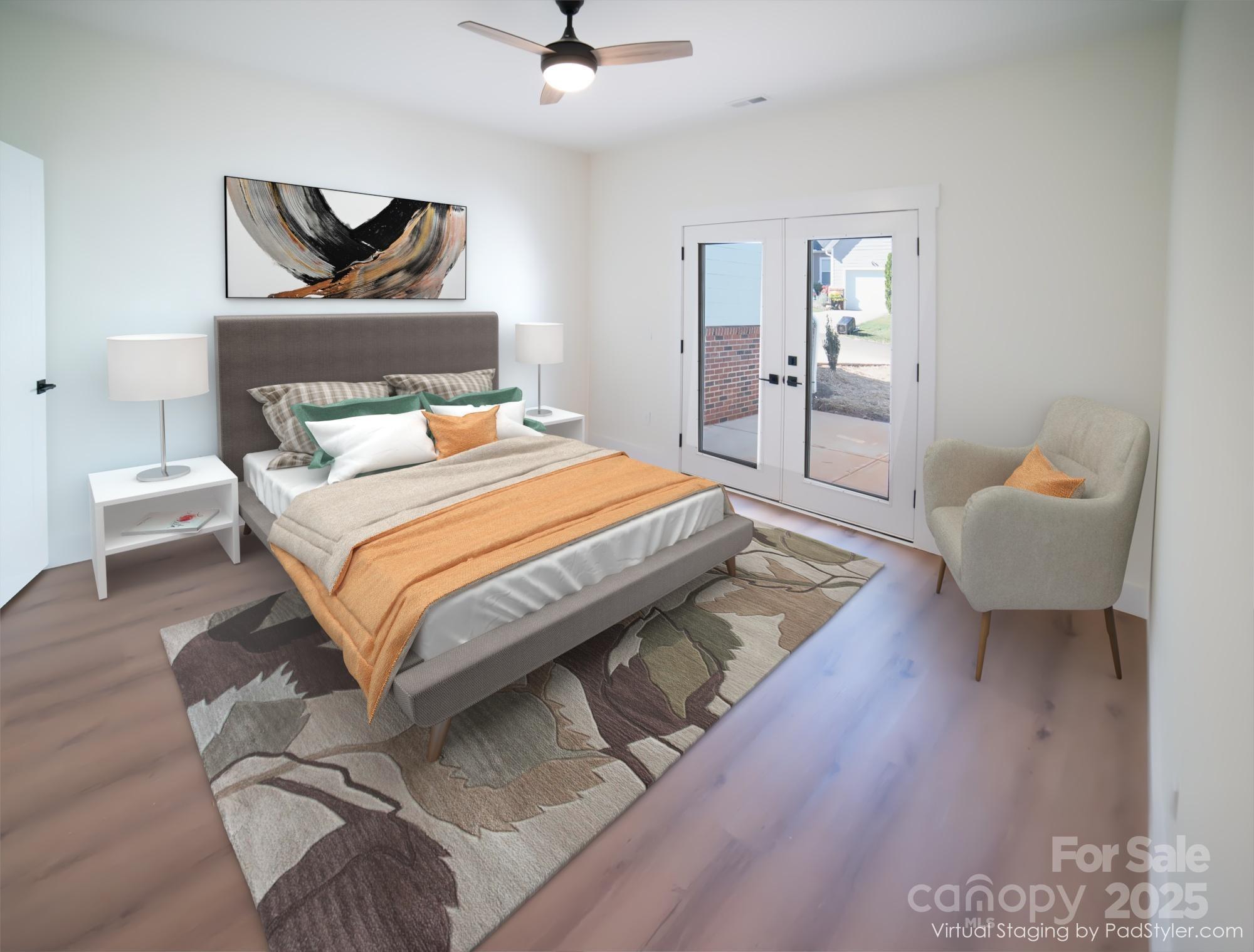 102 Ivy Court Morganton, NC 28655 - Photo 7 of 11 a bedroom with a bed and wooden floor