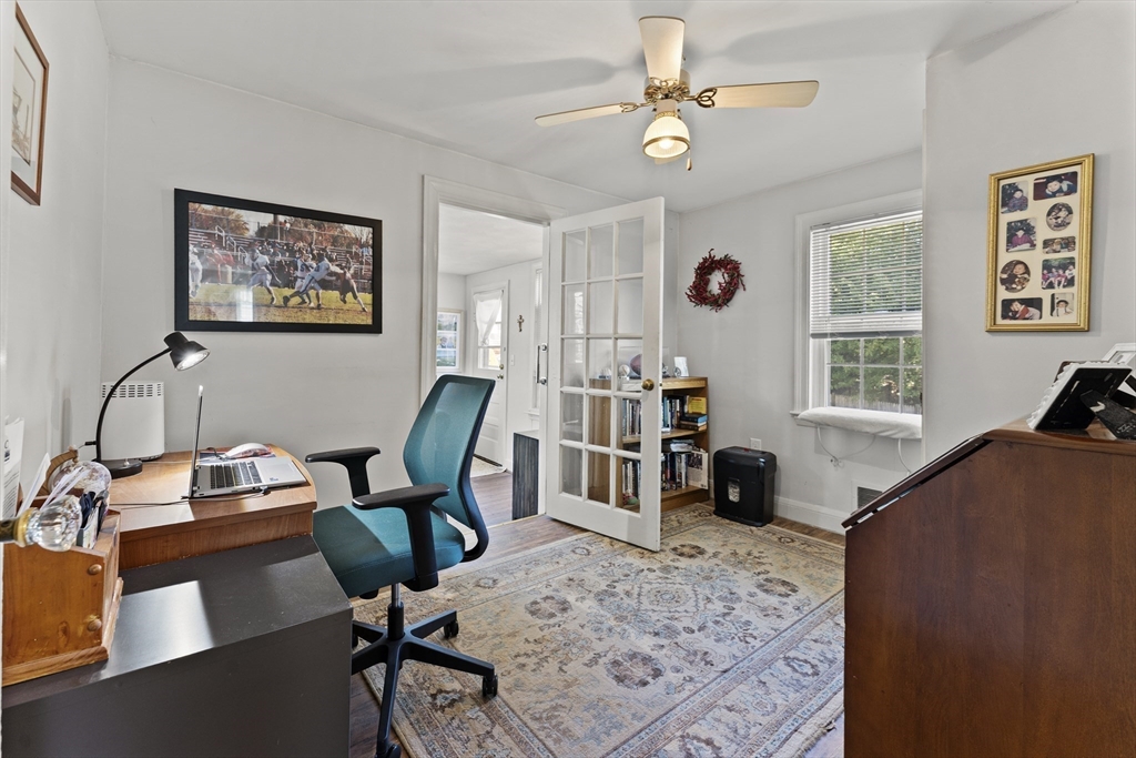 85 Oak Street Stoneham, MA 02180 - Photo 13 of 35 a view of a workspace with furniture and a window