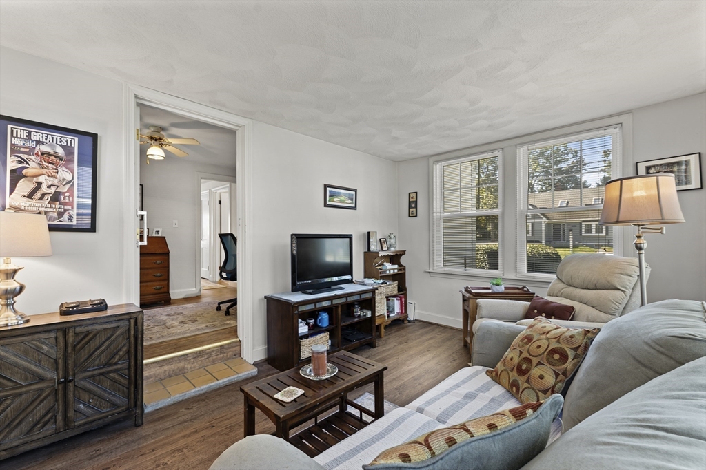 85 Oak Street Stoneham, MA 02180 - Photo 14 of 35 a living room with furniture and a flat screen tv