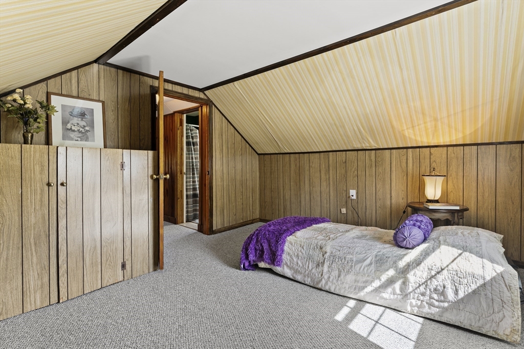 85 Oak Street Stoneham, MA 02180 - Photo 26 of 35 a bedroom with a bed and a window