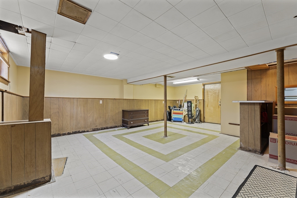 85 Oak Street Stoneham, MA 02180 - Photo 28 of 35 a view of a big room with a table and chairs