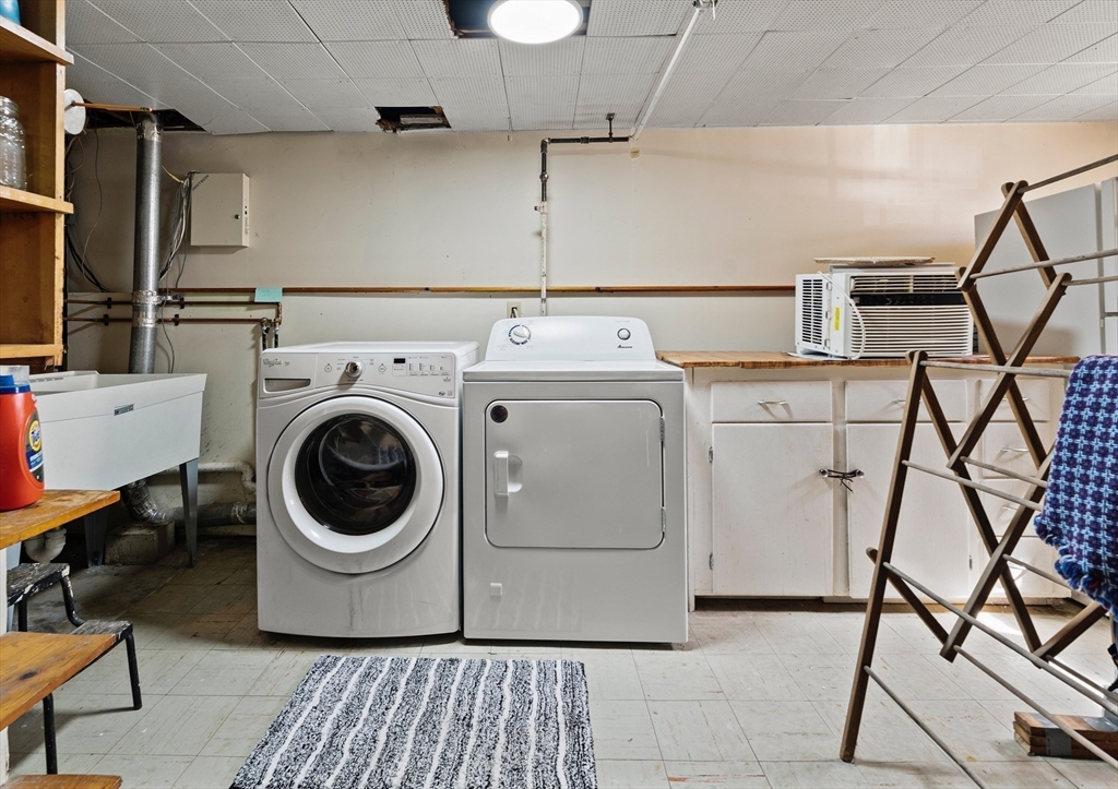 85 Oak Street Stoneham, MA 02180 - Photo 30 of 35 a utility room with dryer and washer