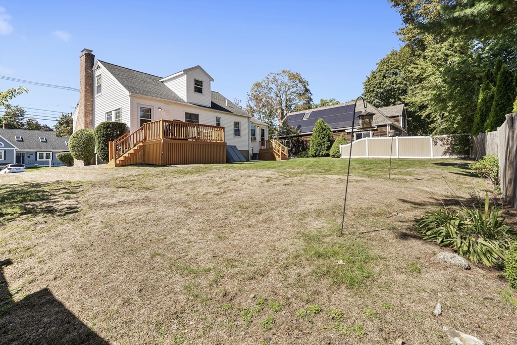 85 Oak Street Stoneham, MA 02180 - Photo 31 of 35 a front view of a house with a yard