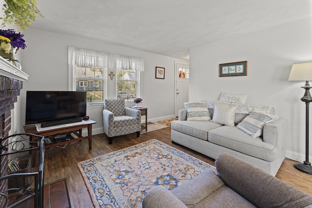85 Oak Street Stoneham, MA 02180 - Photo 7 of 35 a living room with furniture and a flat screen tv