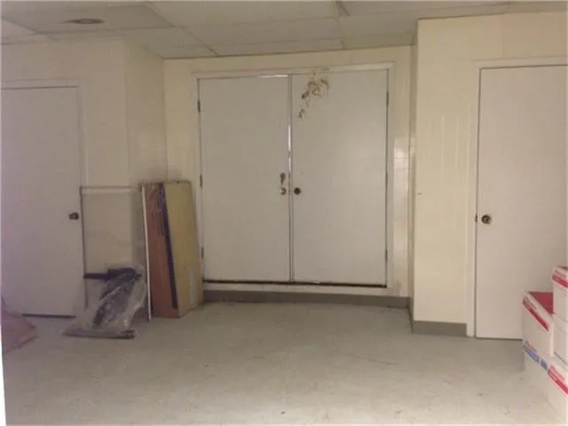 a view of a balcony with yard