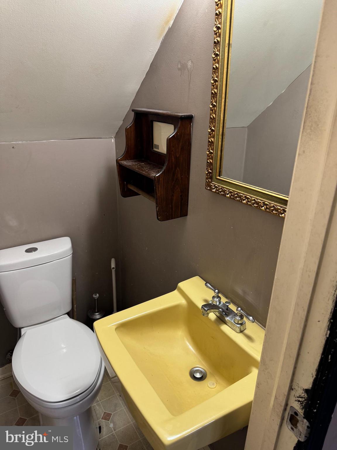 31939 Downing Road Delmar, MD 21875 - Photo 11 of 34 a bathroom with a sink and a toilet