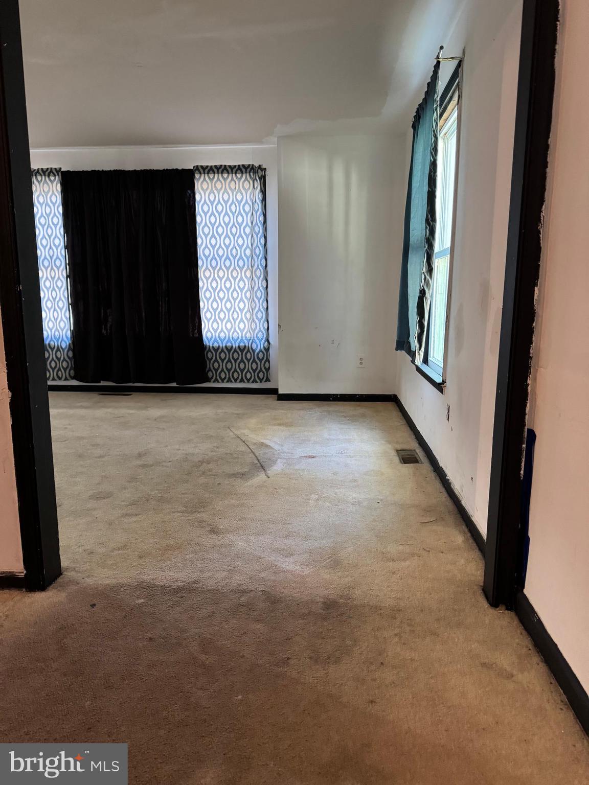 31939 Downing Road Delmar, MD 21875 - Photo 14 of 34 a view of an empty room with windows