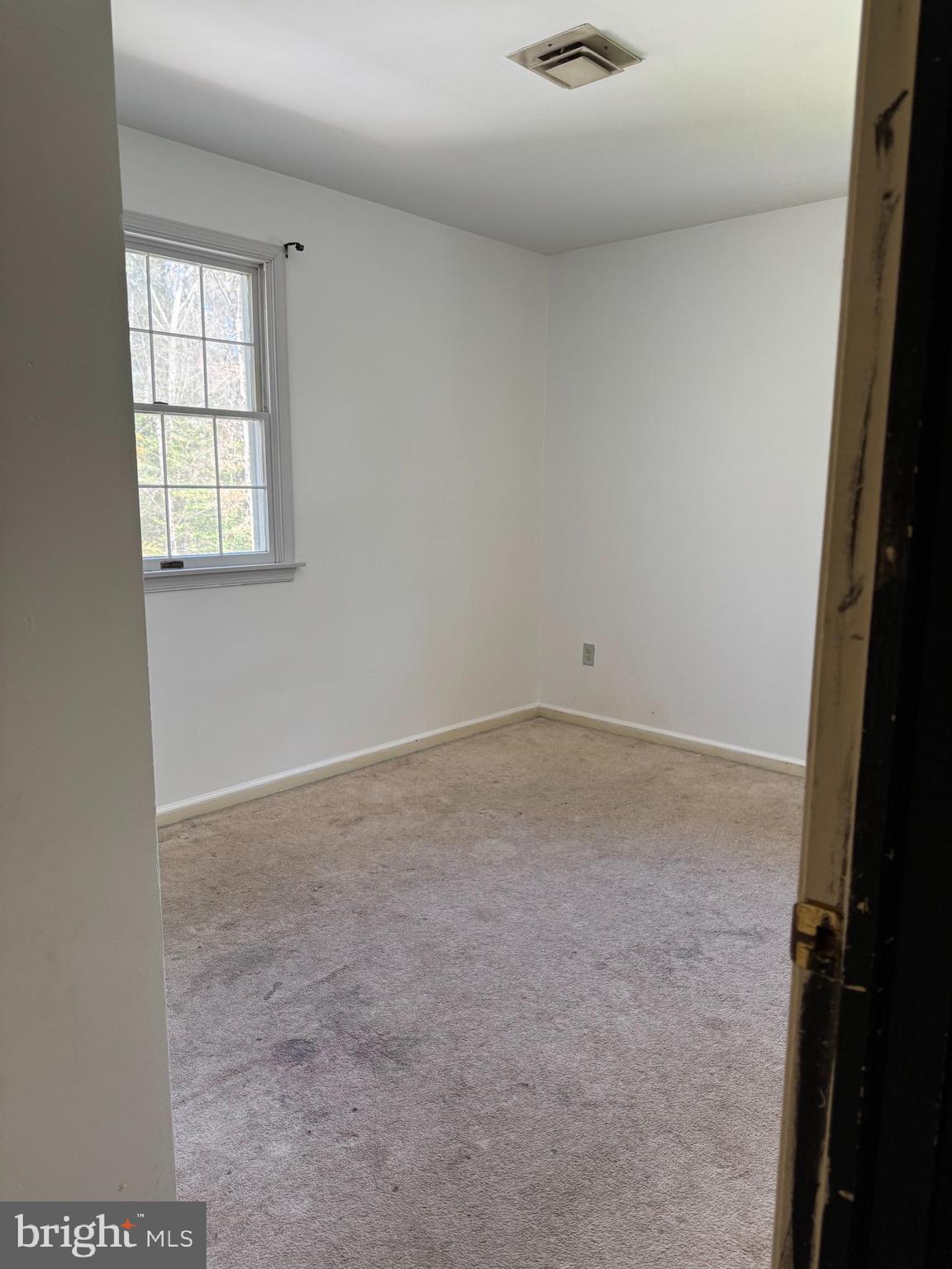 31939 Downing Road Delmar, MD 21875 - Photo 25 of 34 an empty room with a window