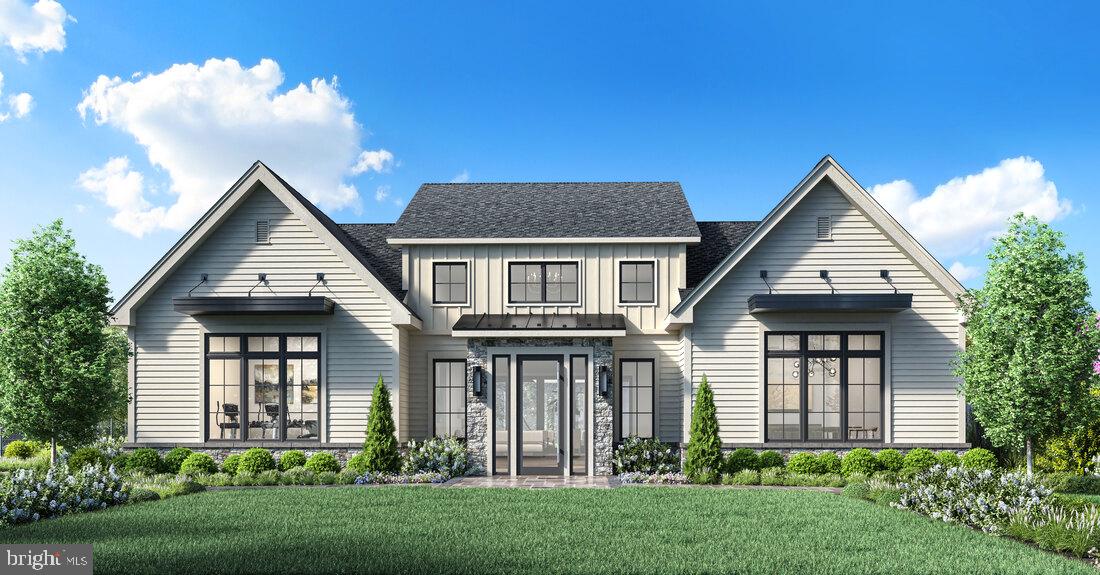 220 Ezra Road, Unit HOMESITE 10 Langhorne, PA 19047 - Photo 5 of 6 a front view of a house with a garden and plants