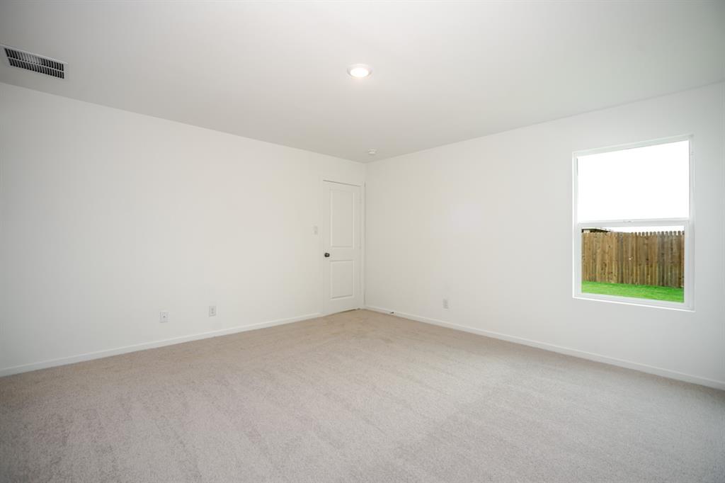 1419 Merlin Blf Street Forney, TX 75126 - Photo 11 of 24 Neutral-toned carpet flooring