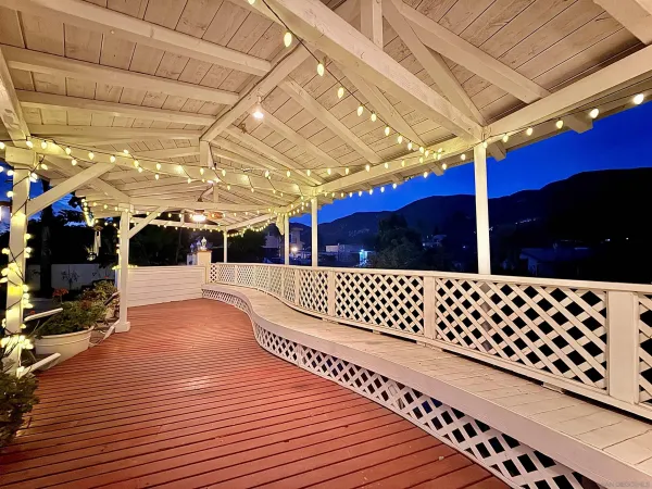 a view of a swimming pool with seating area