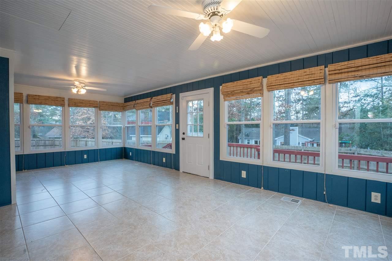 5400 Chilham Place Raleigh, NC 27612 - Photo 14 of 25 a view of an empty room with a window