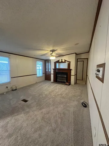 a view of a livingroom with furniture