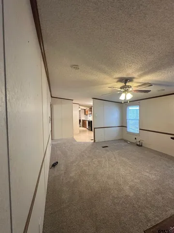 a view of a room with an empty space