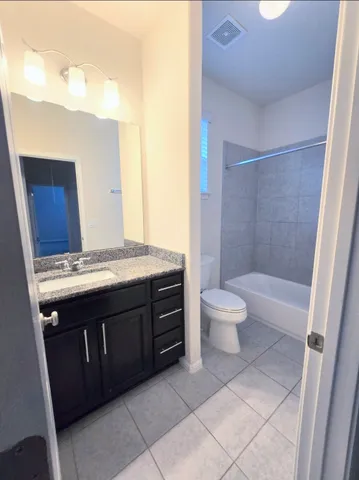 an empty room with a bench