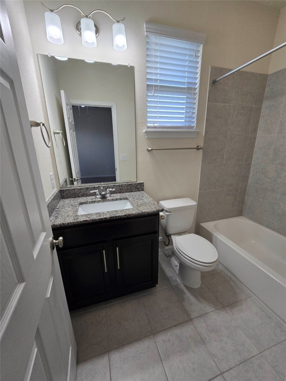 3240 East Whitestone Boulevard, Unit 49 Cedar Park, TX 78613 - Photo 23 of 33 a bathroom with a sink a toilet and mirror