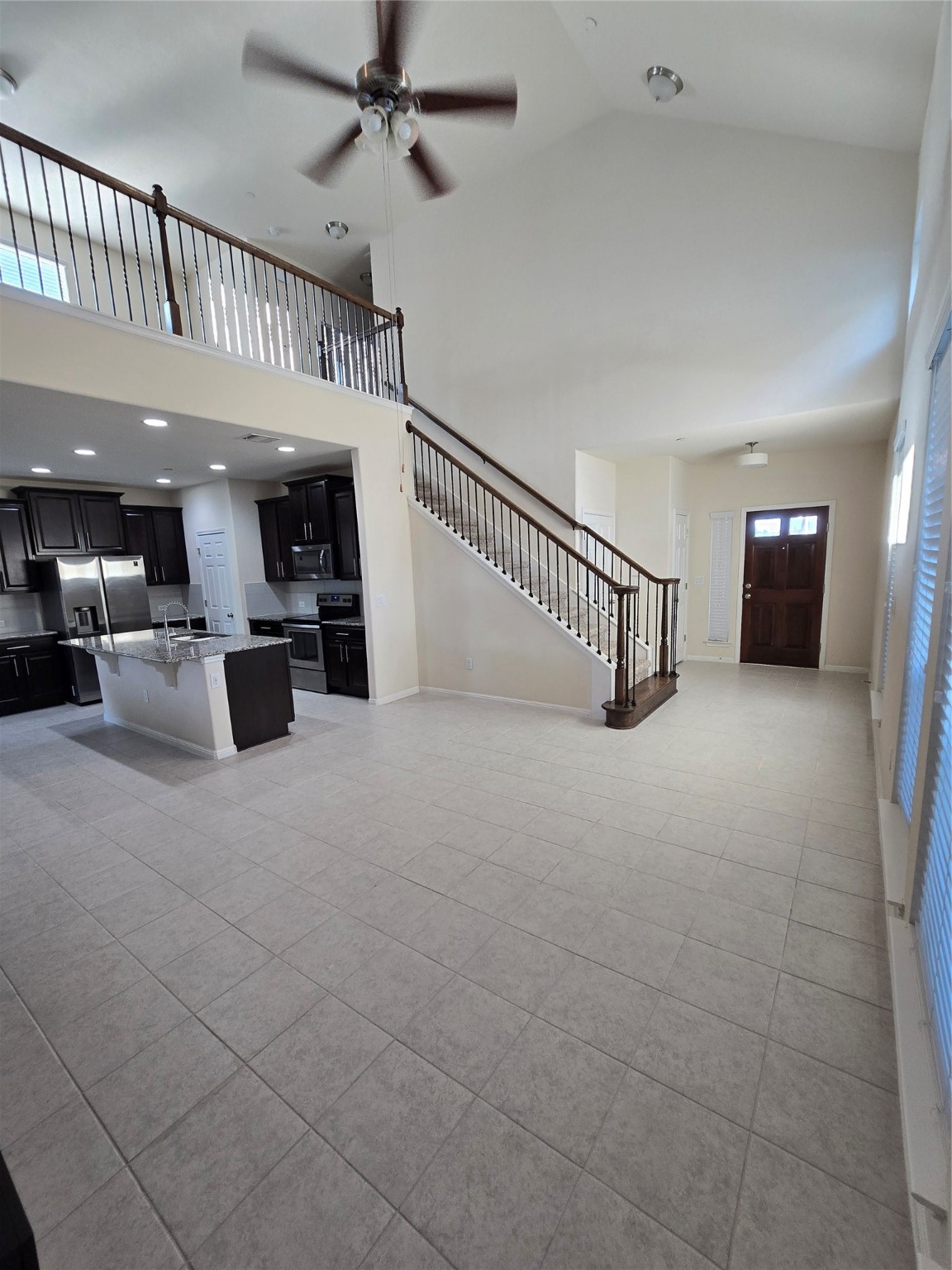 3240 East Whitestone Boulevard, Unit 49 Cedar Park, TX 78613 - Photo 3 of 33 a view of a livingroom with a staircase