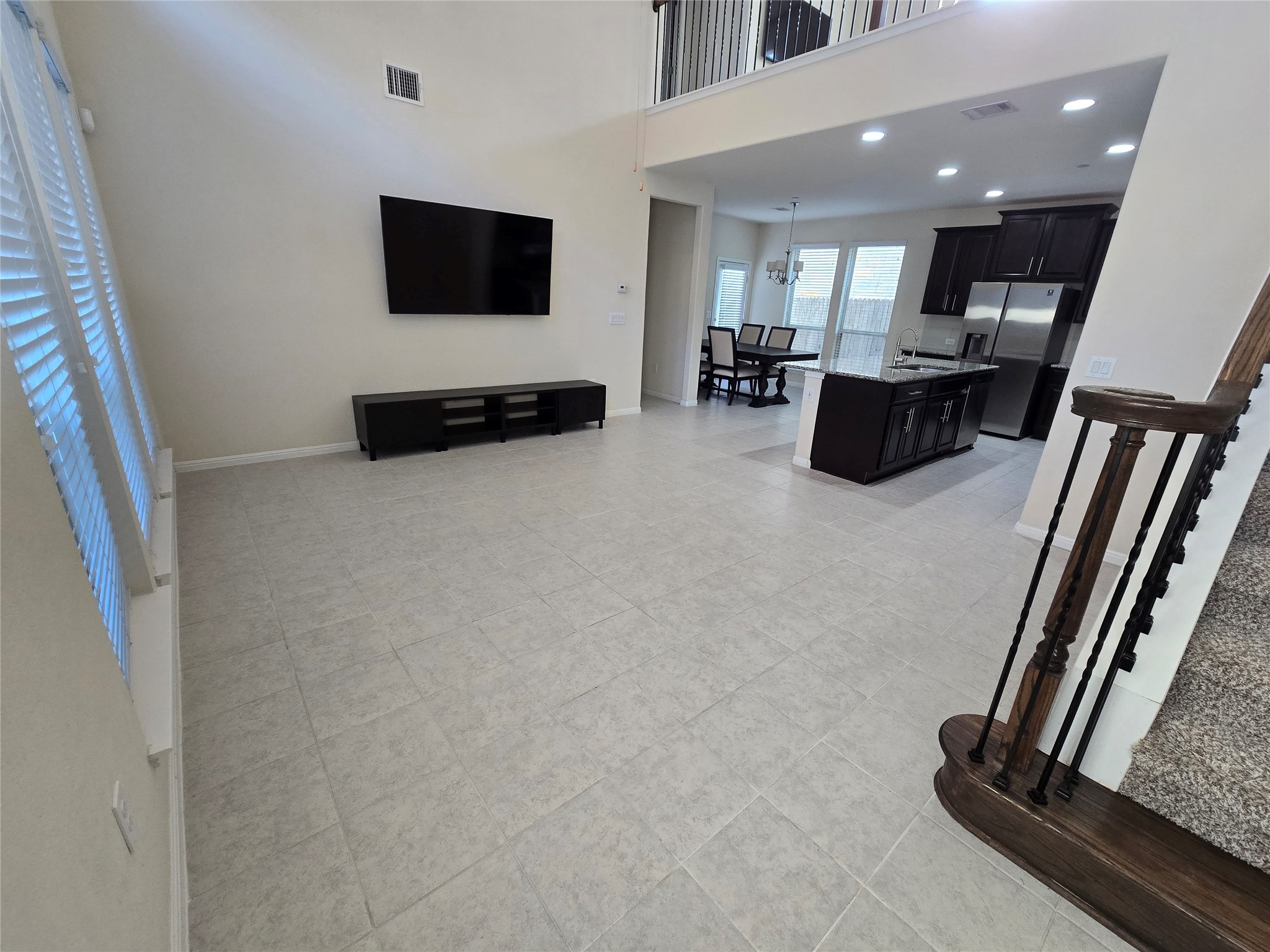 3240 East Whitestone Boulevard, Unit 49 Cedar Park, TX 78613 - Photo 4 of 33 a living room with furniture and a flat screen tv