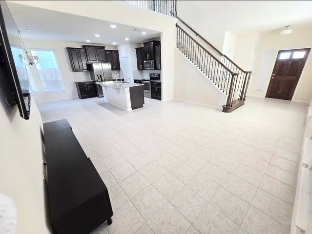 a view of a living room with a sink