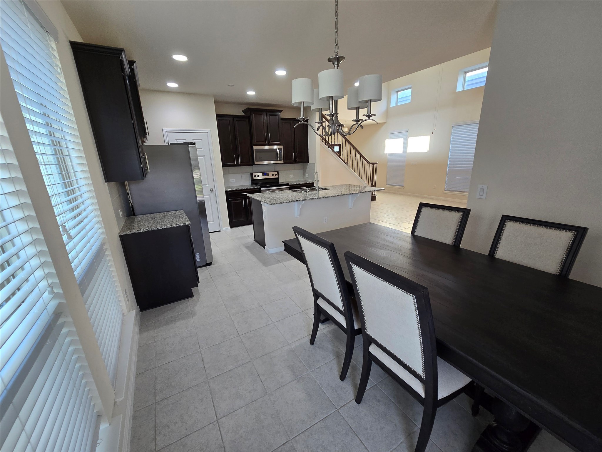 3240 East Whitestone Boulevard, Unit 49 Cedar Park, TX 78613 - Photo 10 of 33 a view of kitchen with cabinets and wooden floor