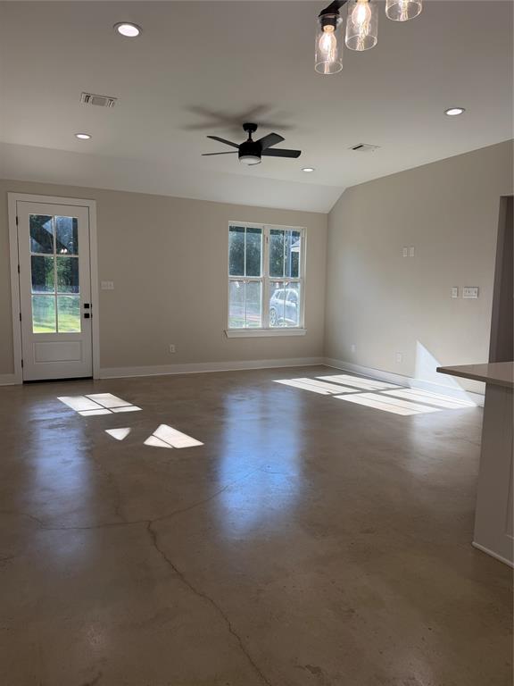 304 Lake Road Plain Dealing, LA 71064 - Photo 5 of 16 wooden floor in an empty room with a window