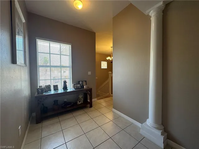 a bathroom with a mirror and bathtub