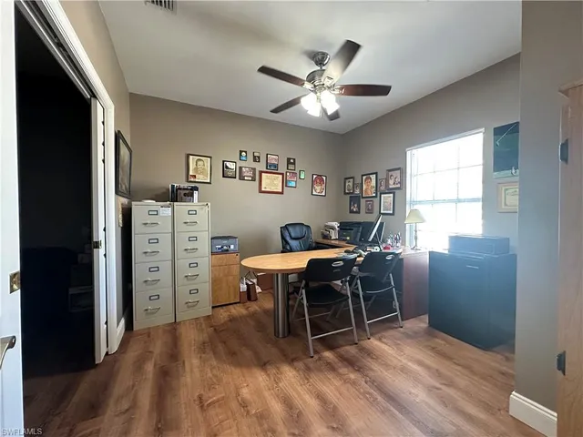 a workspace with wooden floor