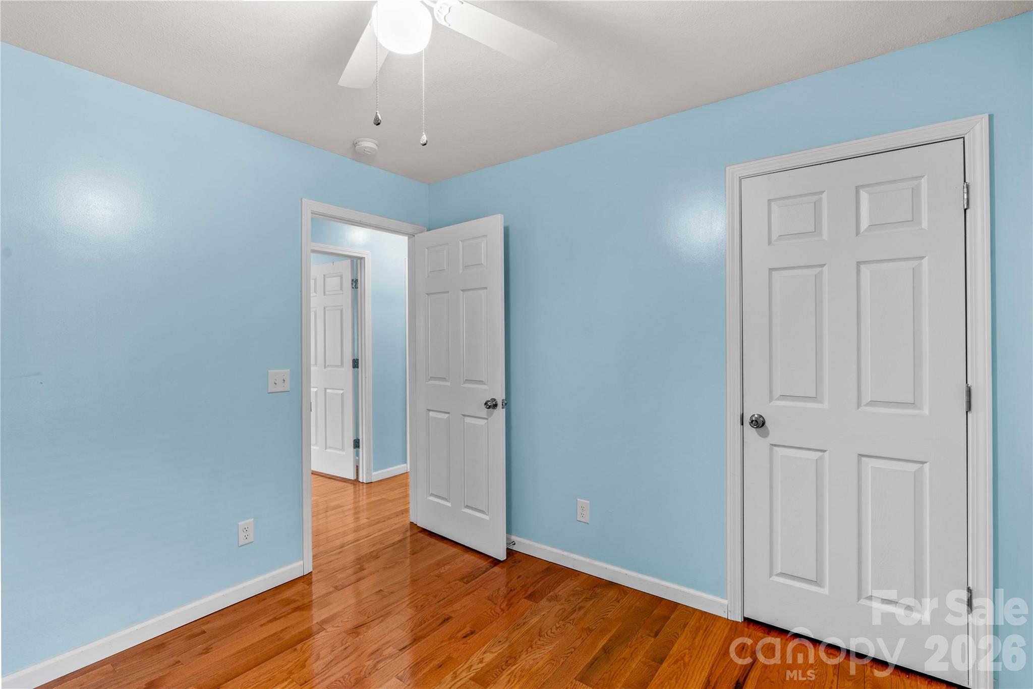 1026 Blue Ridge Ventures Morganton, NC 28655 - Photo 20 of 28 wooden floor in an empty room with a window