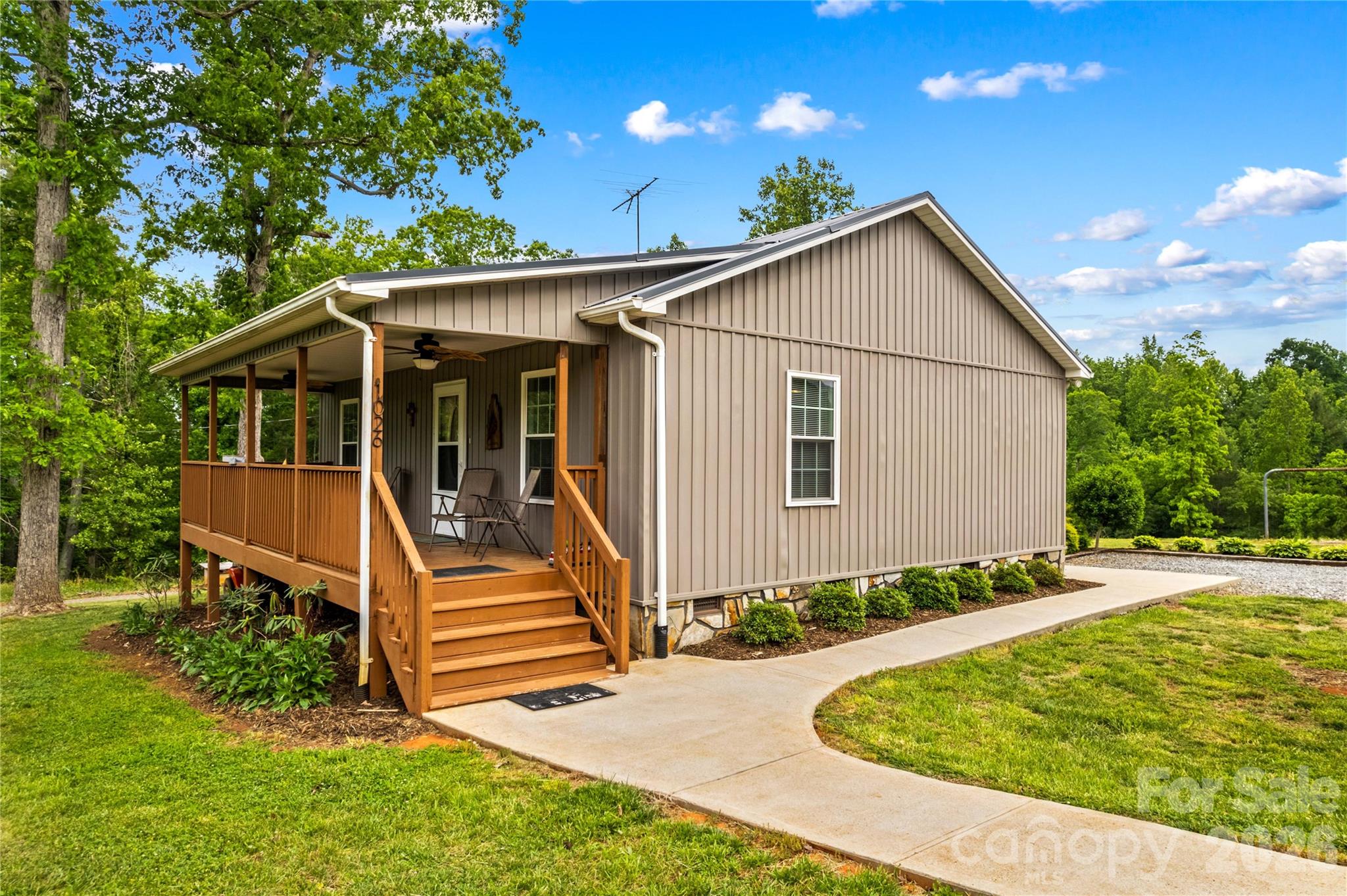 1026 Blue Ridge Ventures Morganton, NC 28655 - Photo 2 of 28 a view of a house with backyard and trees