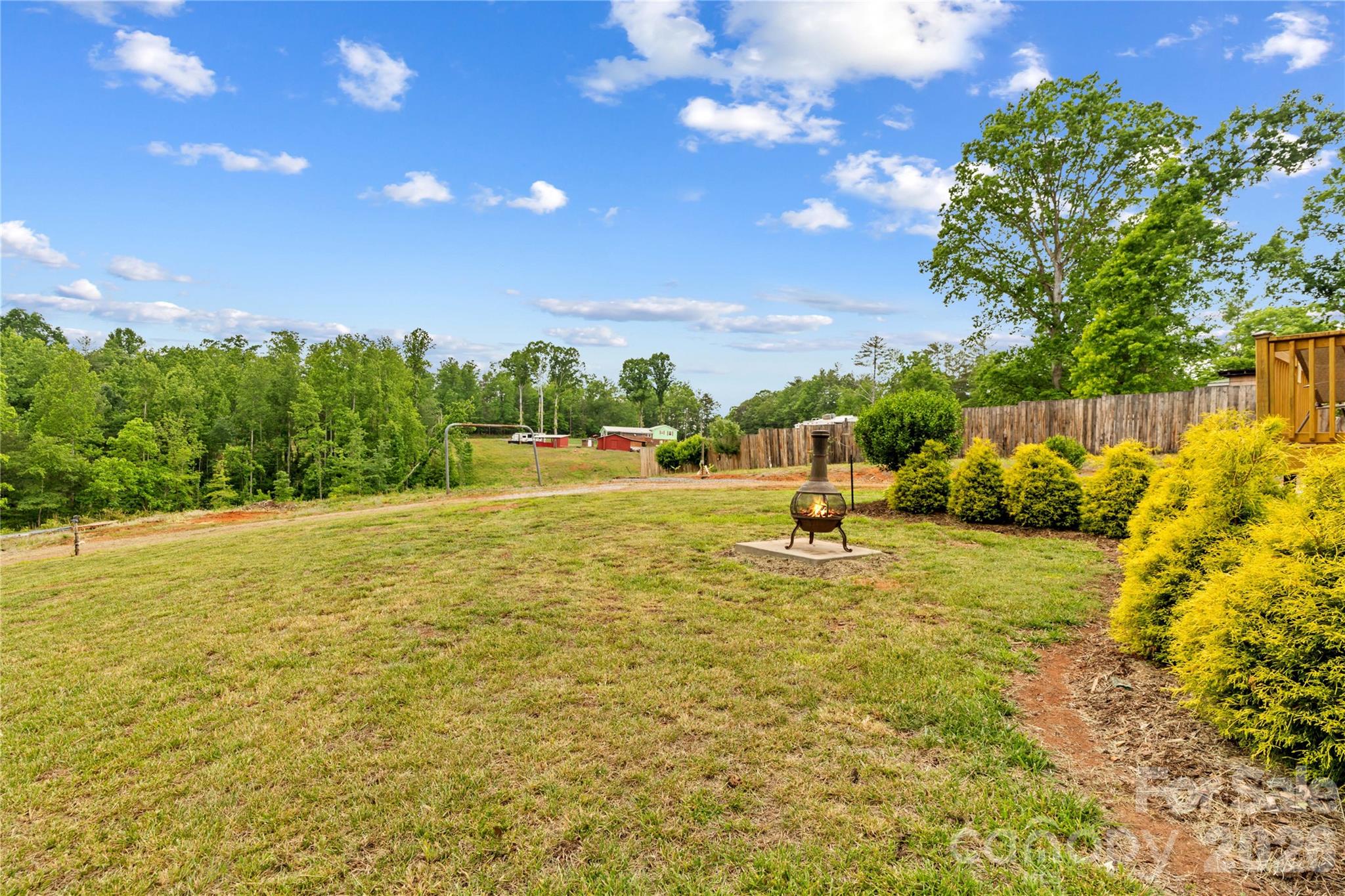 1026 Blue Ridge Ventures Morganton, NC 28655 - Photo 24 of 28 a swimming pool with an outdoor space and seating area