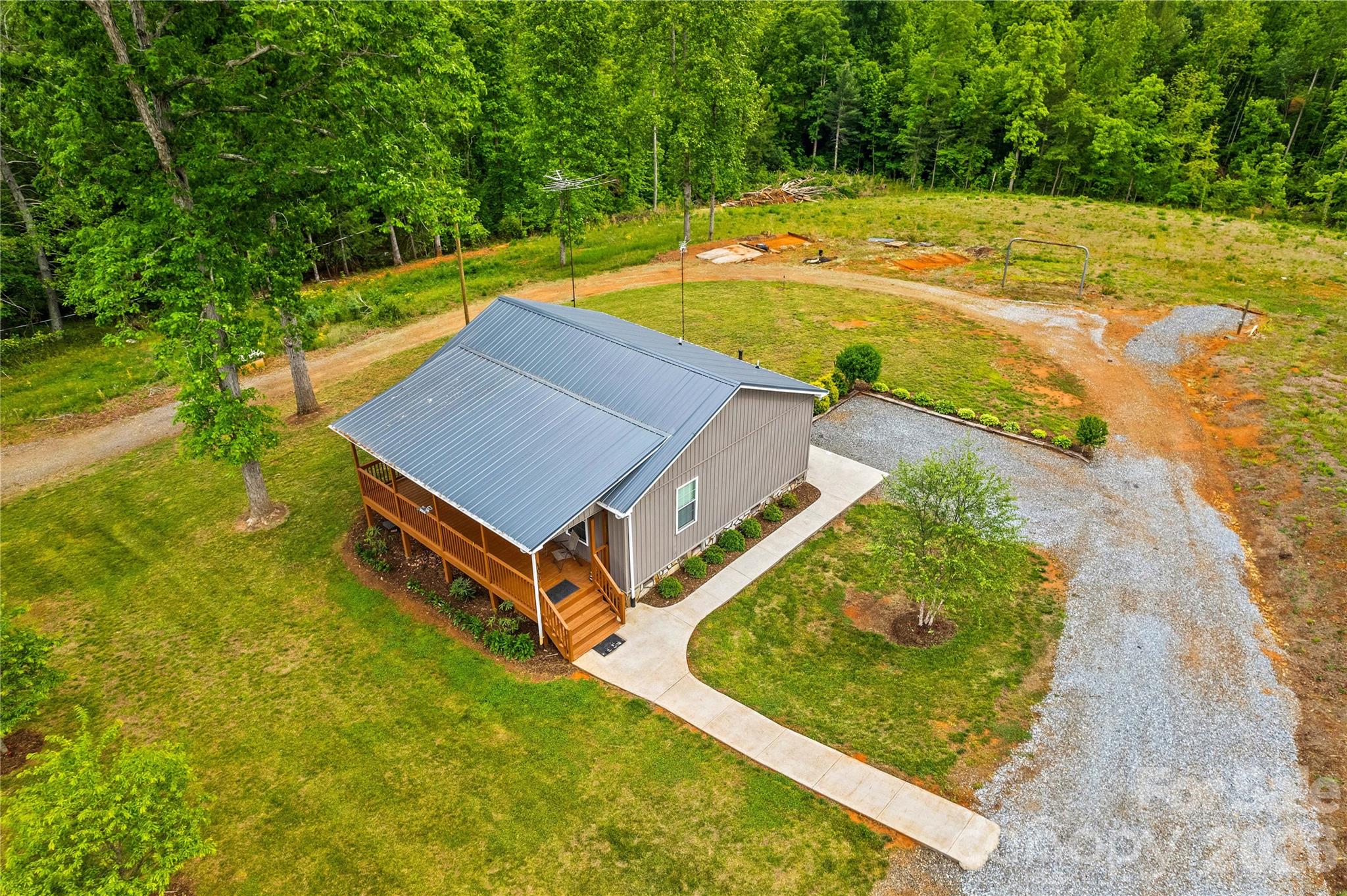 1026 Blue Ridge Ventures Morganton, NC 28655 - Photo 27 of 28 a view of a swimming pool with a yard
