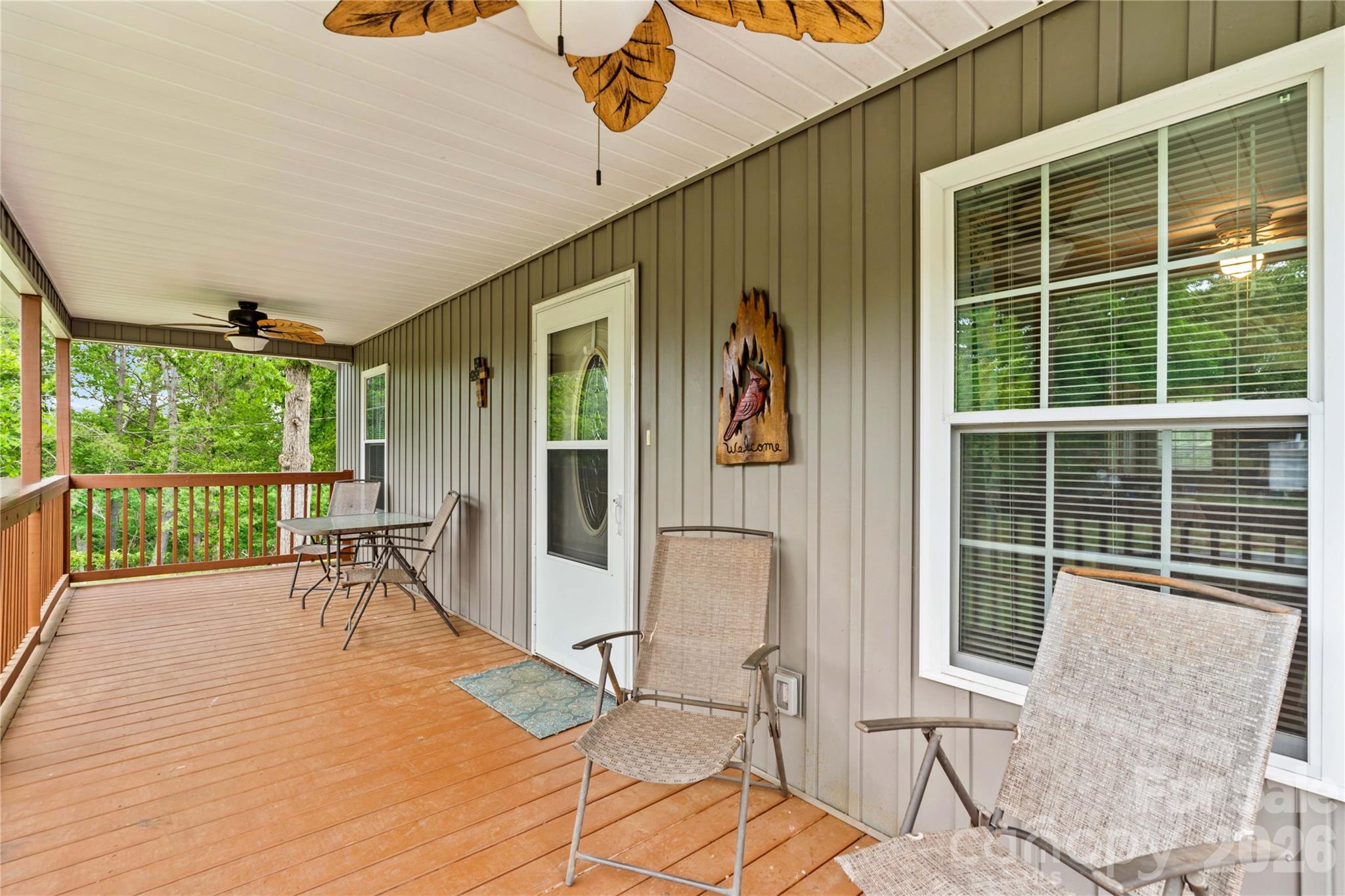 1026 Blue Ridge Ventures Morganton, NC 28655 - Photo 3 of 28 a view of a chair and tables in the balcony