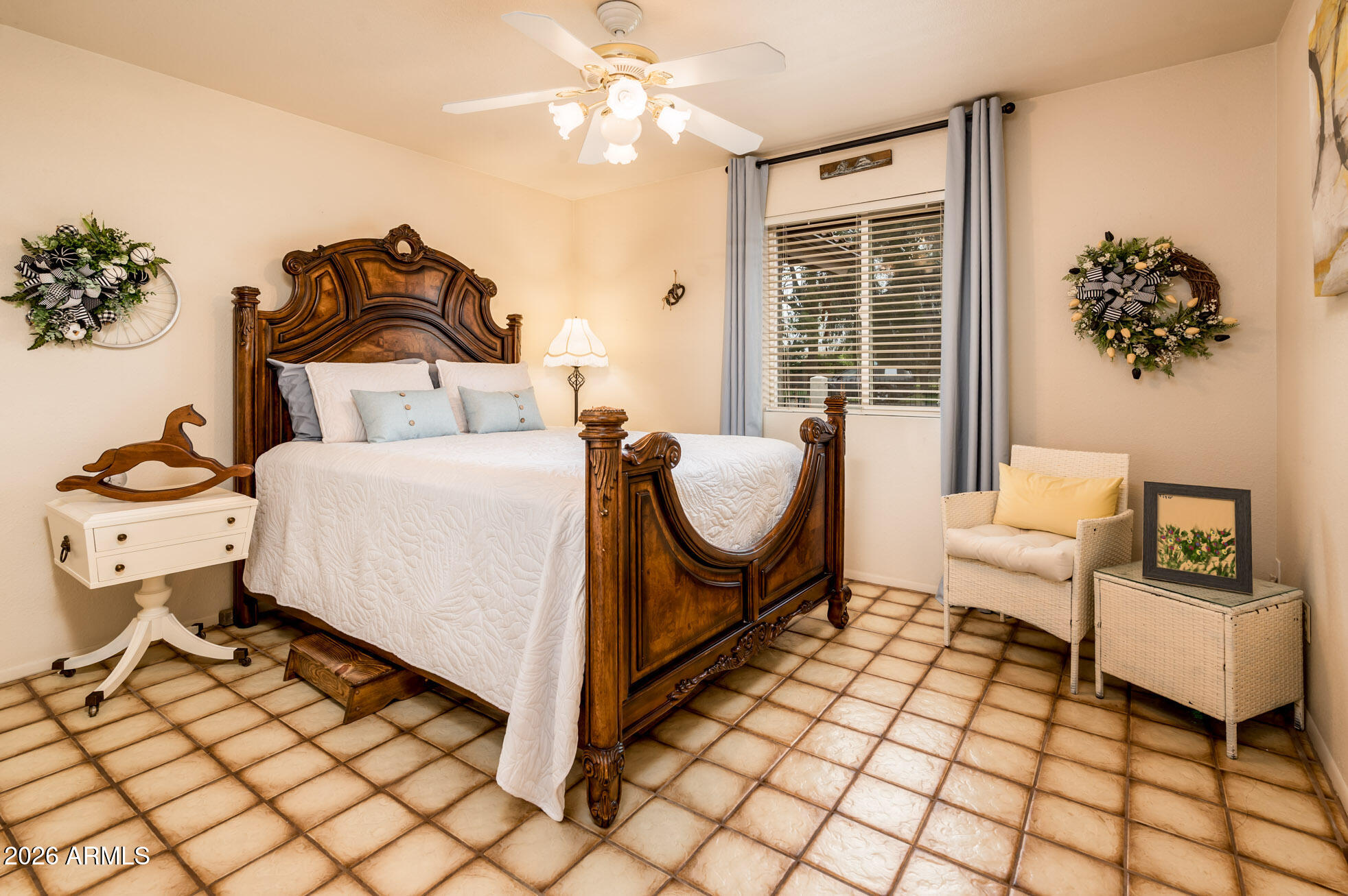 4730 West Piedmont Road Laveen, AZ 85339 - Photo 26 of 65 a bedroom with a bed and a couch